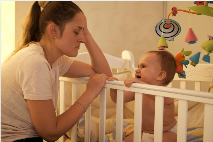 Foto mãe exausta